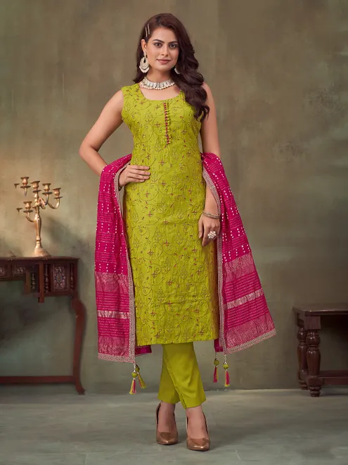Bright green sleeveless silk suit for festive wear