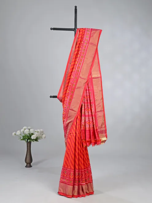 Bright pink printed patola silk saree