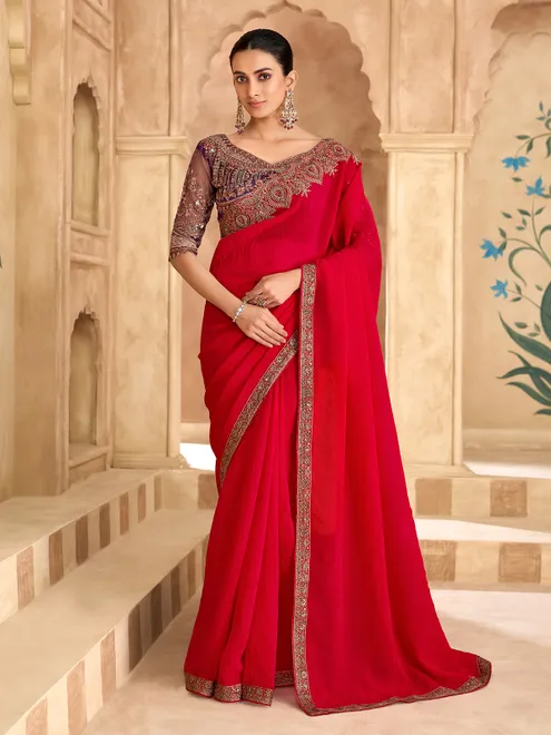 Cherry red luxurious zari wedding saree statement