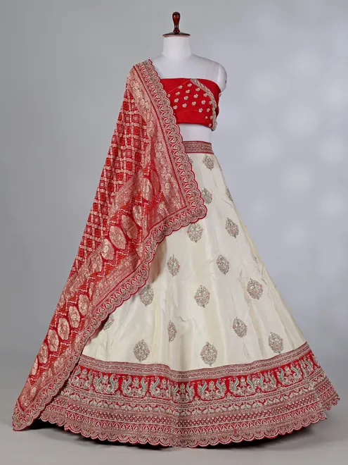 Cream and red silk lehenga choli with zardosi work