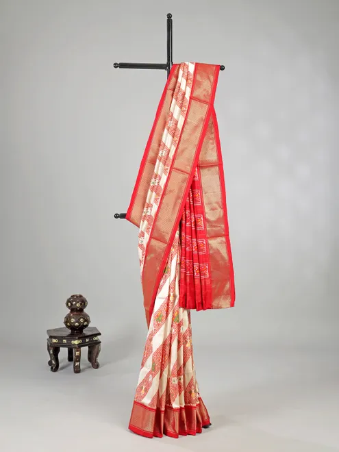 Cream and red zari weaving patola silk saree for festive