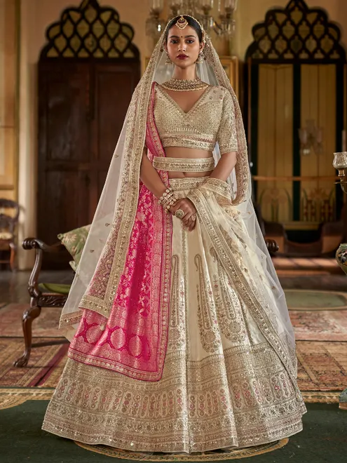 Cream bridal lehenga choli with two dupatta
