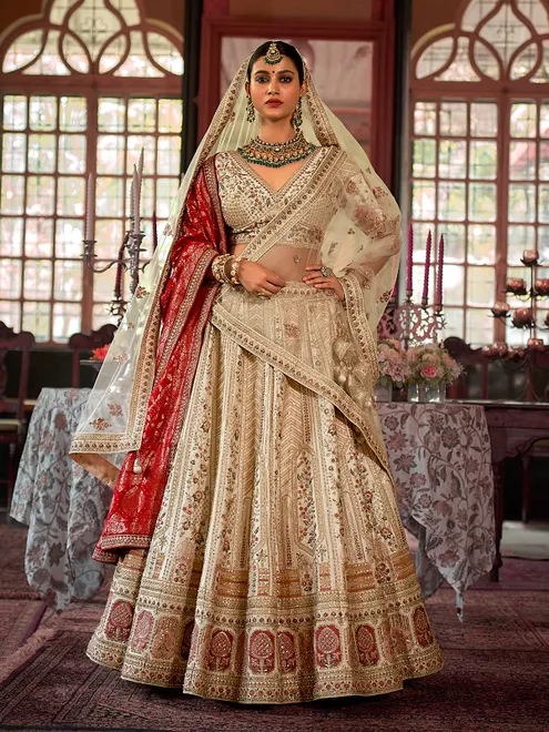 Cream bridal silk lehenga choli with with red banarasi dupatta