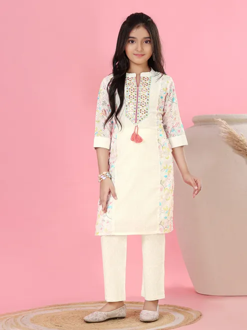 Cream cotton cutwork printed salwar suit for girls