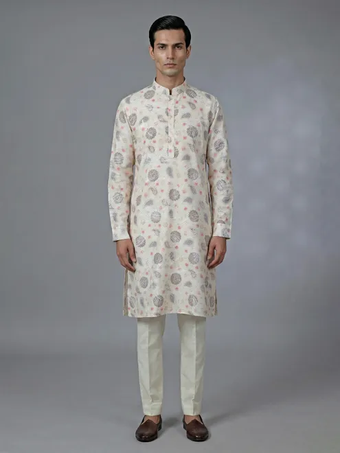 Cream cotton kurta suit with thread work and printed accents