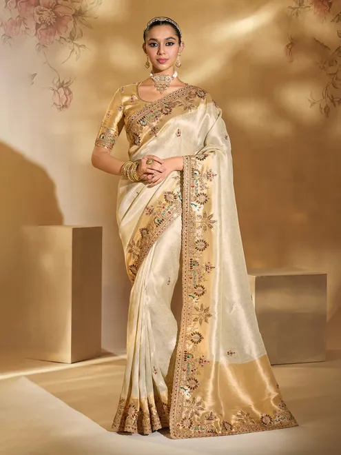 Cream festive wear silk saree with resham work