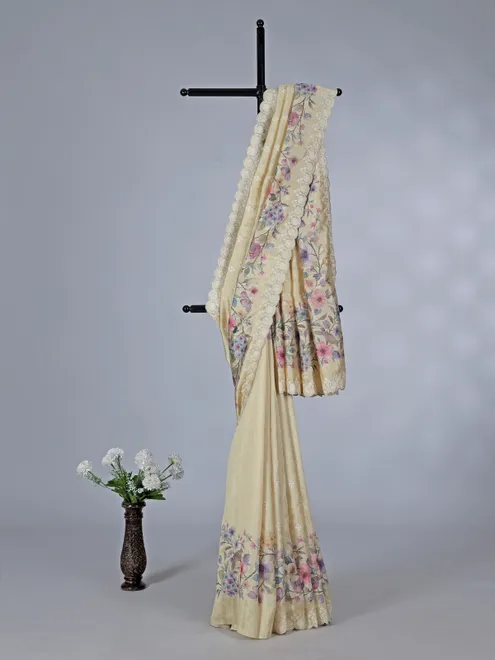 Cream floral art silk saree with embroidery and resham work