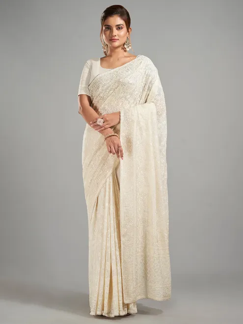 Cream georgette embroidery saree