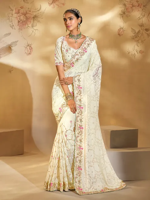 Cream georgette saree with thread detailing