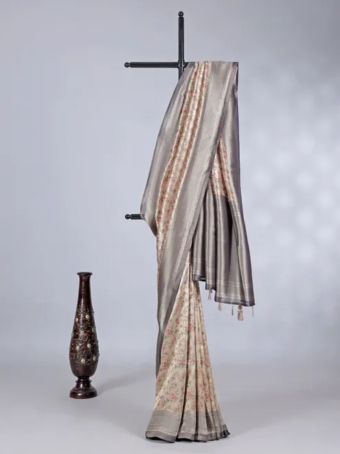Cream georgette silk saree with contrast floral design