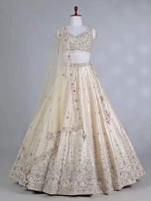 Cream raw silk bridal lehenga choli with sequins work