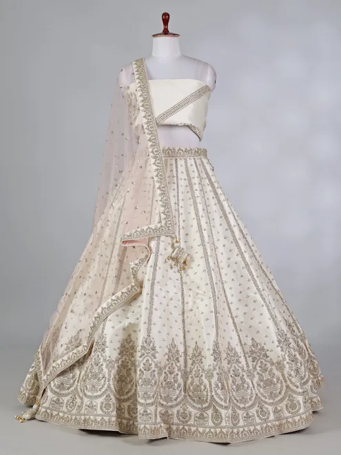 Cream raw silk bridal lehenga choli with zardosi work