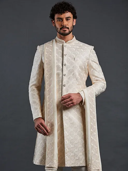 Cream raw silk sherwani in finest work for groom