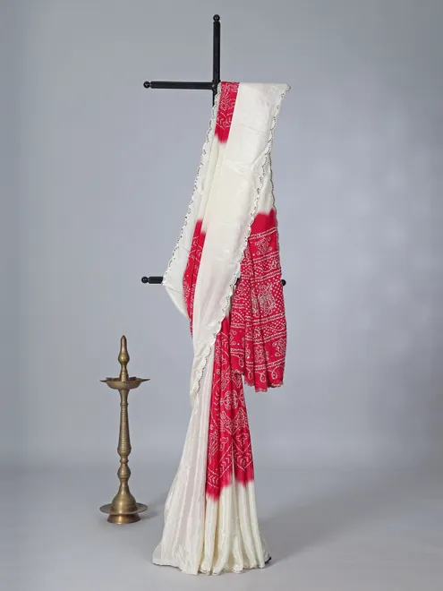 Cream red bandhej printed festive wear saree