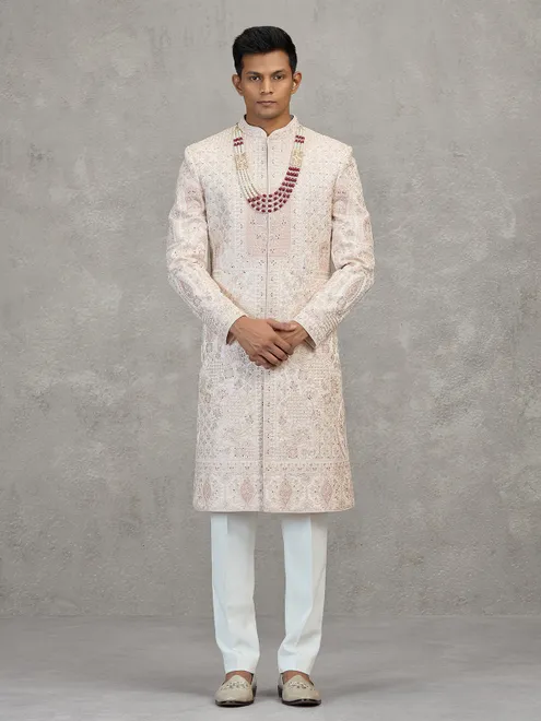 Cream satin silk sherwani with resham and cutdana work