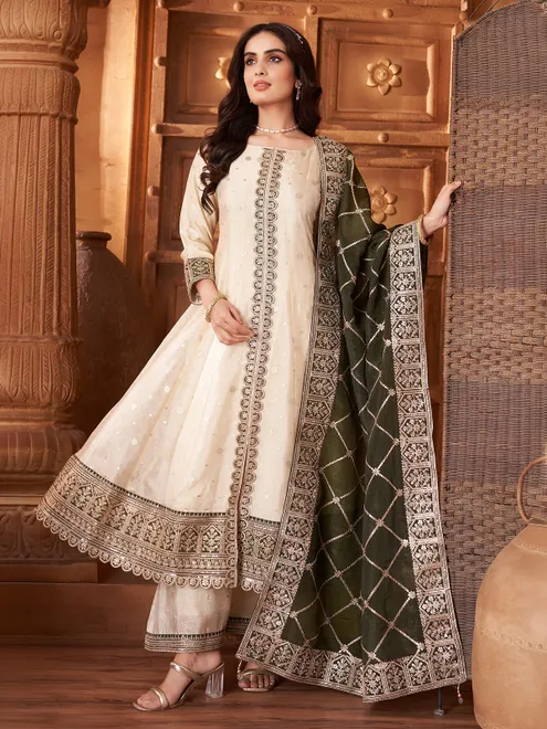 Cream silk anarkali suit paired with dupatta