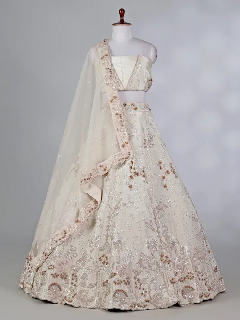 Cream silk lehenga choli with pearls and cutdana work