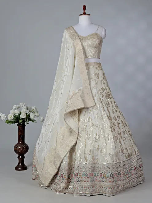 Cream silk lehenga choli with sleeveless choli