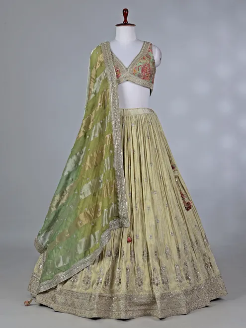 Cream silk lehenga choli with zardosi work