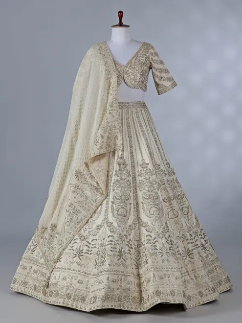 Cream silk lehenga with resham and sequins work