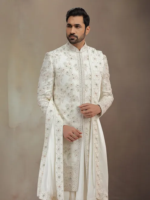 Cream silk peshwa style sherwani with dupatta for groom