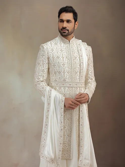 Cream silk peshwai groom sherwani with dupatta