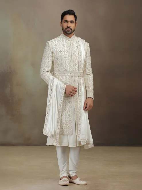 Cream silk peshwai groom sherwani with dupatta