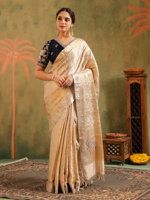 Cream silk saree designed for wedding