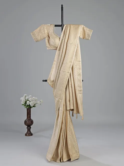 Cream silk saree with readymade work blouse
