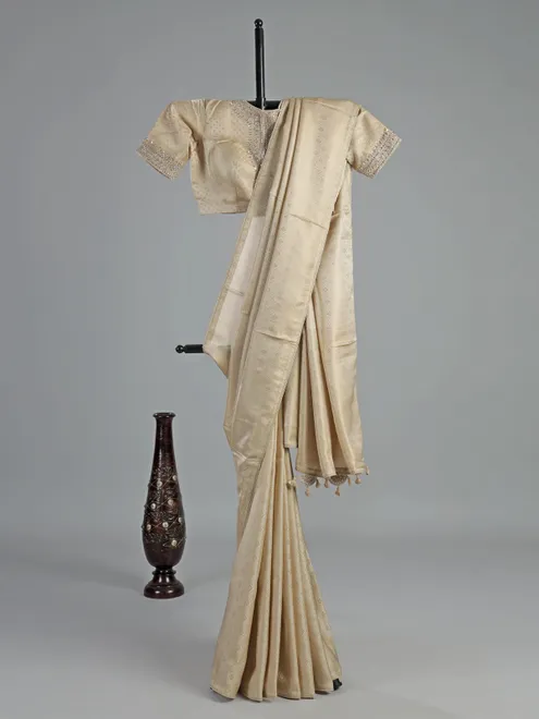 Cream silk saree with zardosi detailing