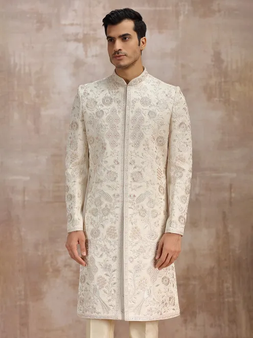 Cream silk sherwani featuring fine embroidery