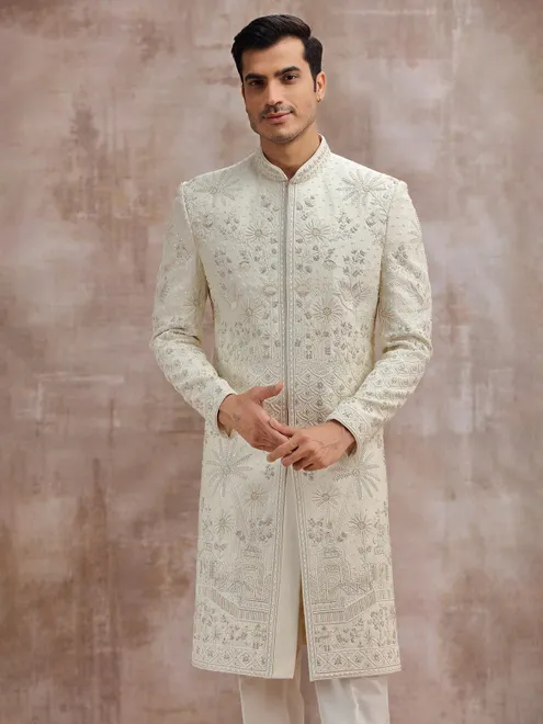 Cream silk wedding sherwani with cutdana embellishment