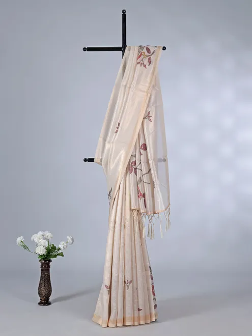 Cream tissue cotton silk saree with sequins and embroidery detailing
