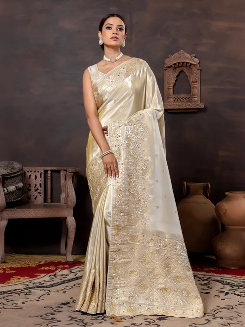 Cream wedding wear saree in rich dola silk