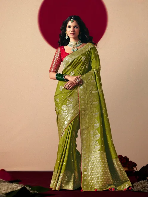 Dark green dola silk zari weaving saree
