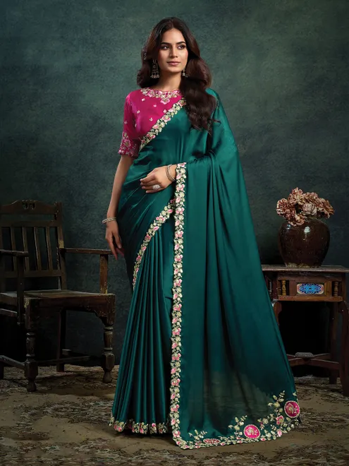 Dark green embroidered satin silk festive saree