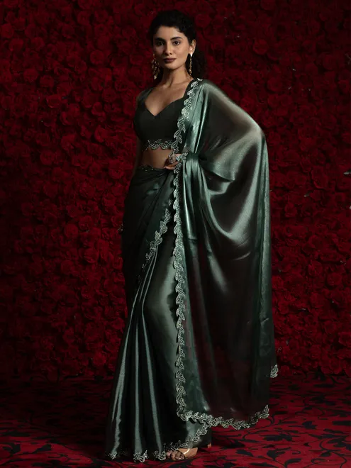 Dark green party wear chiffon saree