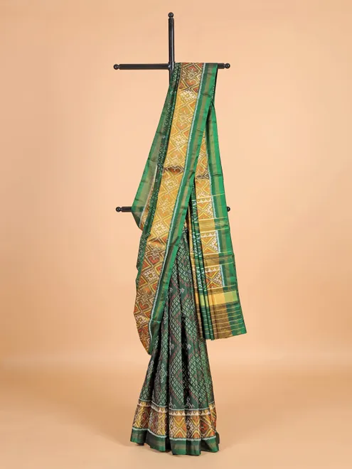 Dark green patola silk saree