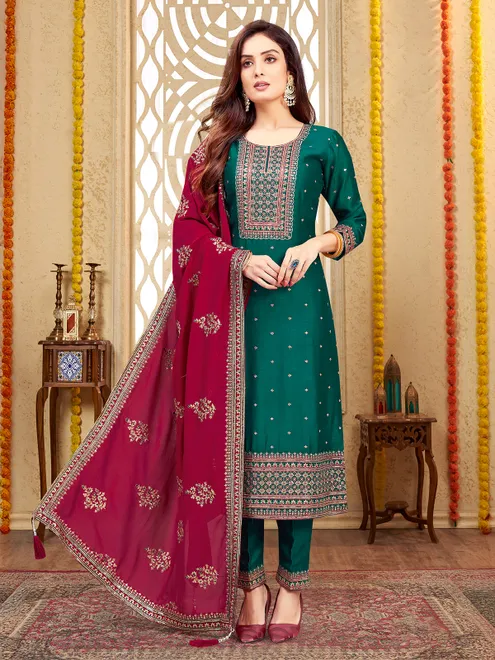 Dark green silk salwar suit with maroon dupatta