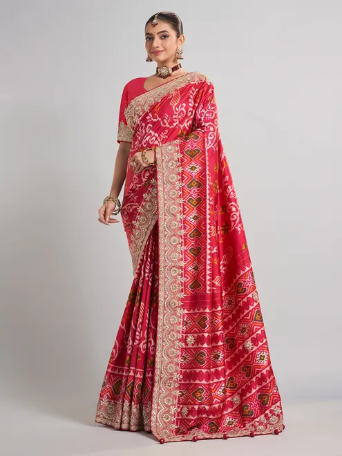 Deep rani pink patola silk saree for bridal festivities