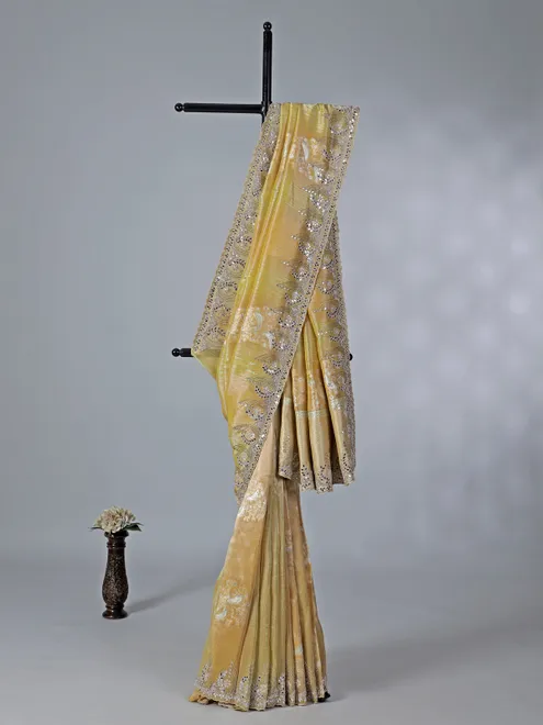 Dusty yellow dola tissue silk saree with zardosi work