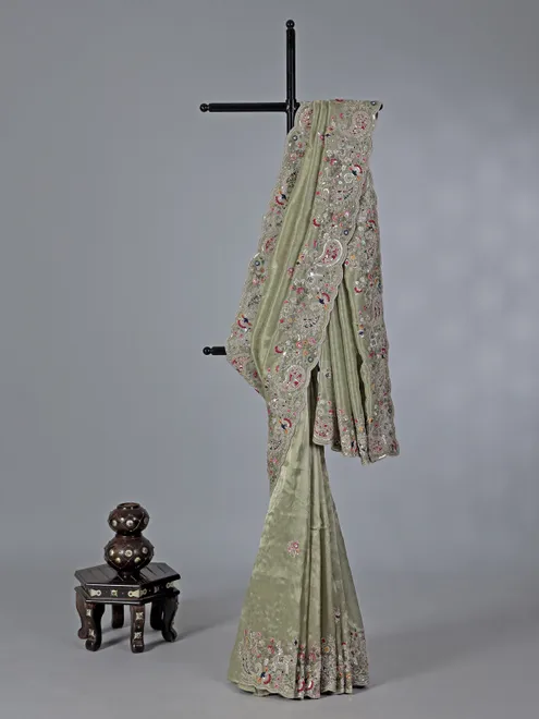 Elegant pista green tissue silk saree