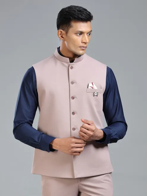Festive fresh look with peach waistcoat for men