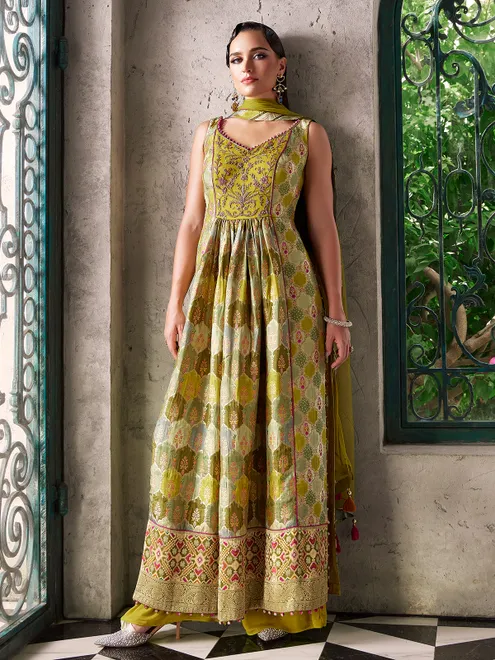 Floor-length mehendi silk palazzo suit with majestic handwork