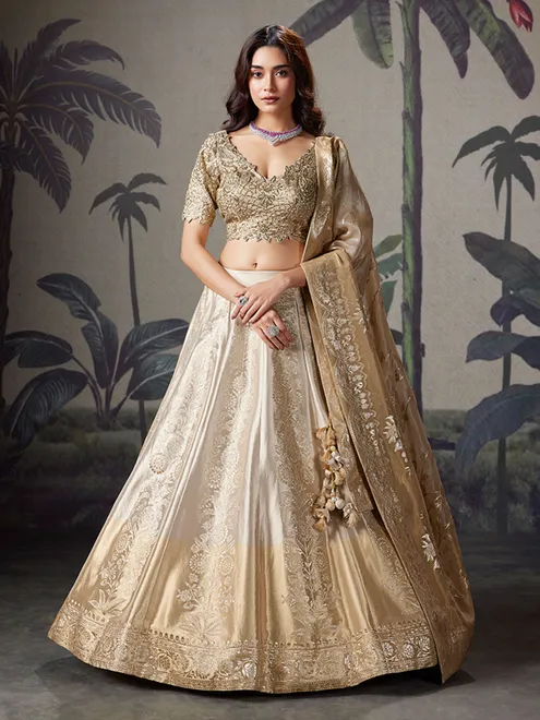 Gold and silver wedding wear lehenga choli