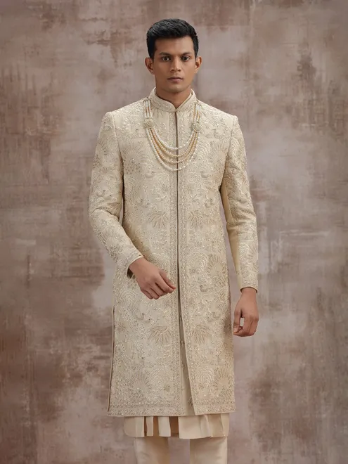 Gold art silk peshwai sherwani with dupatta for wedding