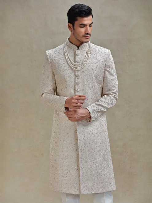Gold coloured long sherwani in silk for groom