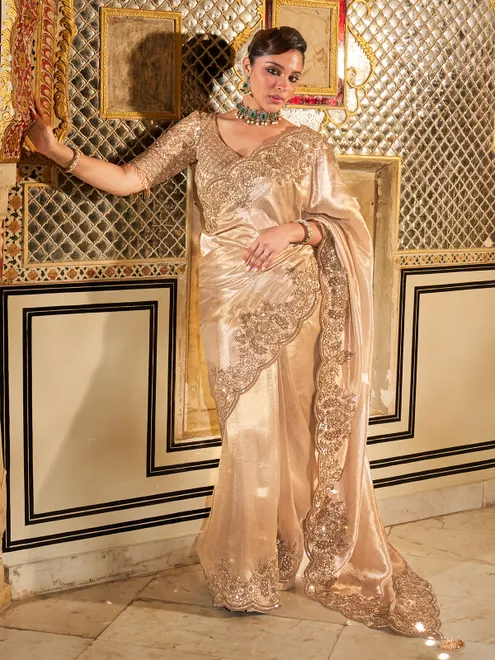 Gold shimmer tissue silk saree with subtle textured drape