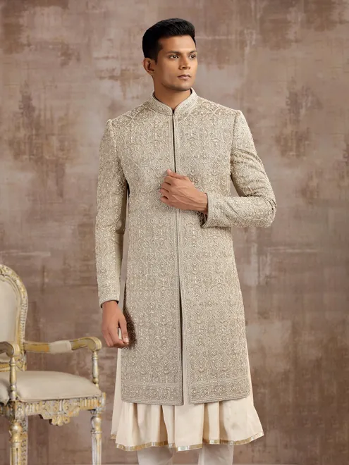 Gold silk peshwai sherwani with subtle shine