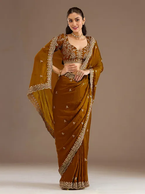 Gold tissue saree with cutdana and sequins work